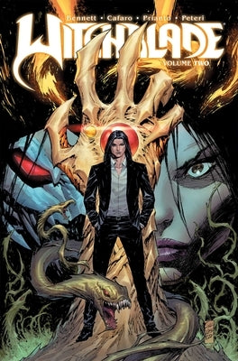 Paperback copy of Witchblade Volume 2 comic book by Image Comics, featuring cover art with dynamic superhero imagery.