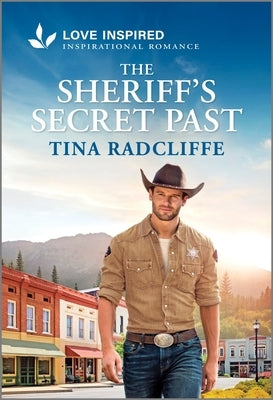 Mass market paperback of The Sheriff's Secret Past, an inspirational romance by Love Inspired, featuring a heartfelt cover image.