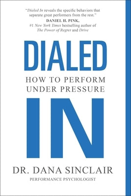 Paperback book titled "Dialed In: How to Perform Under Pressure" by Simon & Schuster, featuring a close-up of the cover.