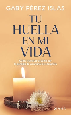 Paperback book titled "Tu Huella En Mi Vida" about coping with pet loss, with a soft cover and heartfelt design.