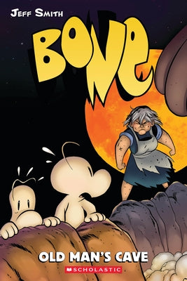 Paperback copy of Old Man's Cave: A Graphic Novel from Bone #6 by Graphix, featuring cover art with illustrated scenes.