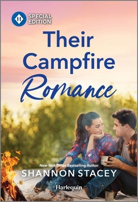 Mass market paperbound book titled "Their Campfire Romance" by Harlequin Special Edition, featuring a cozy campfire scene on the cover.