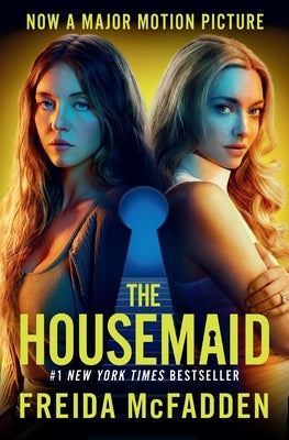 Paperback copy of The Housemaid novel by Grand Central Publishing with a cover featuring dark and moody artwork.