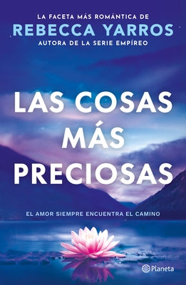 Paperback novel "Las Cosas Más Preciosas" by Planeta Publishing, featuring a cover with warm colors and book title text.