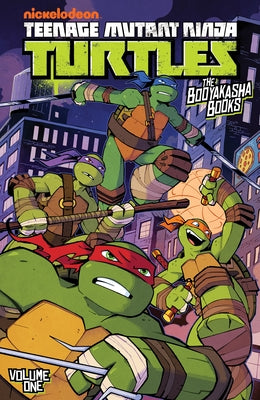 Paperback of Teenage Mutant Ninja Turtles: The Booyakasha Books, Vol. 1 by IDW Publishing, featuring colorful TMNT characters on the cover.