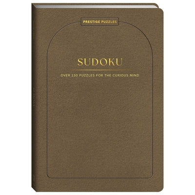 Solve It! Faux Suede Puzzles Sudoku paperback book with a colorful cover featuring Sudoku grid and vibrant design elements.