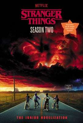 Paperback copy of Stranger Things Season Two Junior Novelization by Random House Books for Young Readers, featuring cover art.
