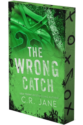 Paperback of "The Wrong Catch: A Football Romance" deluxe limited edition by Podium Publishing, showing the book cover with football-themed artwork.