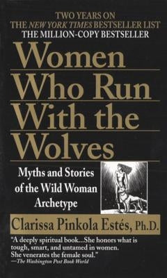 Mass market paperbound of "Women Who Run with the Wolves" by Ballantine Books, showing the book cover with title and wolf illustration.
