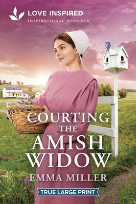 Paperback book titled "Courting the Amish Widow" by Love Inspired True Large Print, featuring a romantic Amish scene on the cover.