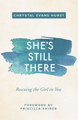 Paperback copy of "She's Still There: Rescuing the Girl in You" by Zondervan, featuring the book cover with title and design.