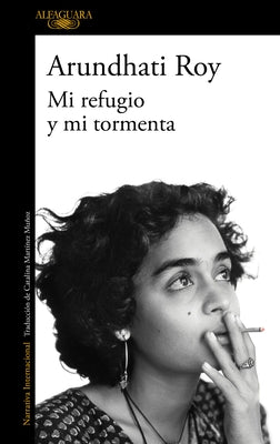 Paperback of "Mi Refugio Y Mi Tormenta" by Alfaguara, featuring cover art of Mother Mary on a soft, textured background.