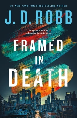 Paperback copy of "Framed in Death" by St. Martin's Griffin, featuring the book cover with dark and moody artwork.