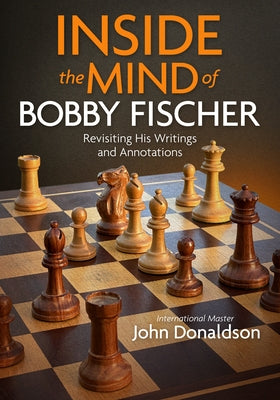 Paperback book titled "Inside the Mind of Bobby Fischer" with annotations and writings, published by Silman-James Press.