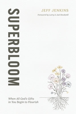 Superbloom paperback book by Anchor Collective with colorful floral cover design, lying open on a wooden surface.