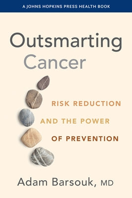 Paperback book titled "Outsmarting Cancer" by Johns Hopkins University Press, featuring a cover with cancer awareness imagery.