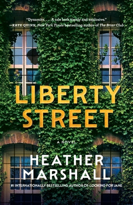 Paperback copy of Liberty Street novel by Ballantine Books, featuring the book cover with title and author graphics.