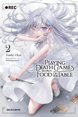Paperback copy of "Playing Death Games to Put Food on the Table, Vol. 2" by Yen on, with cover art visible.