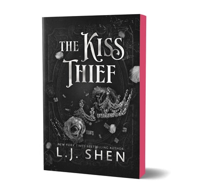Paperback of The Kiss Thief Deluxe Edition by Bloom Books, featuring the book cover with romantic artwork and title.