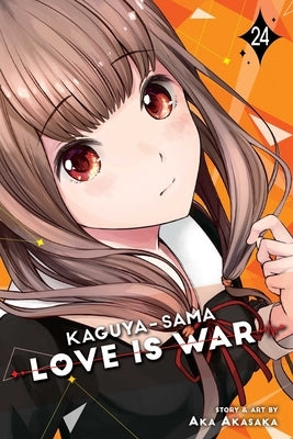 Paperback of Kaguya-Sama: Love Is War, Vol. 24 manga by Viz Media featuring the cover art with characters in a school setting.