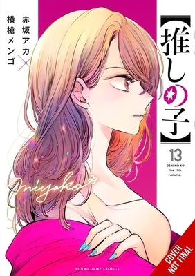 Paperback of Oshi No Ko Volume 13 manga by Yen Press, featuring colorful cover art and illustration on the front.