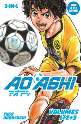 Paperback copy of Aoashi 3-in-1 Edition Volume 1 by Titan Manga, featuring colorful manga cover art and illustrations.