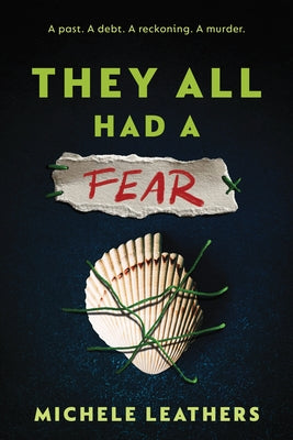 Paperback copy of "They All Had a Fear" by Sourcebooks Fire with a cover featuring dark, moody artwork.