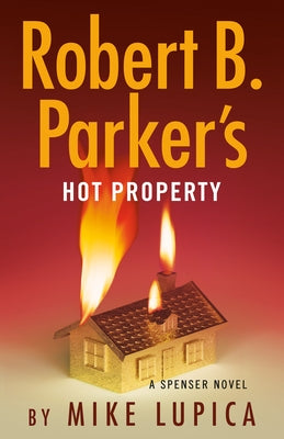 Paperback copy of Robert B. Parker's Hot Property with cover art featuring urban scene and bold title lettering.