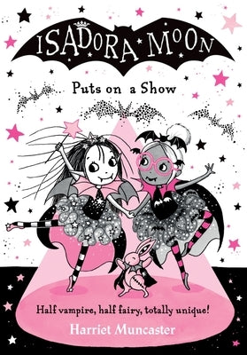 Paperback of Isadora Moon Puts on a Show, Volume 10 by Oxford Children's, showing the colorful book cover with illustrated characters.