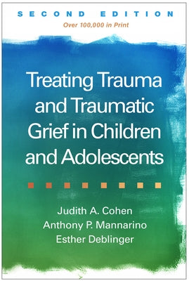 Paperback book titled "Treating Trauma and Traumatic Grief in Children and Adolescents" by Guilford Publications, with a focus on mental health.