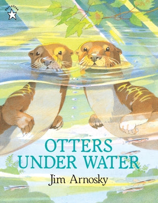Paperback book titled "Otters Under Water" by Puffin Books, featuring an underwater scene with otters swimming.