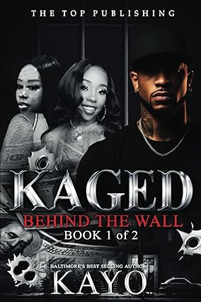 Paperback copy of "Kaged: Behind The Wall," an independently published book with a dark cover and title text visible.