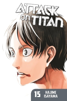 Paperback of Attack on Titan 15 manga by Kodansha Comics showing the cover with characters and title.