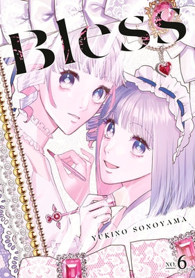 Paperback copy of Bless 6 manga by Kodansha Comics featuring colorful cover art.