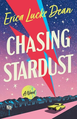 Paperback copy of "Chasing Stardust" by Lake Union Publishing, featuring the book cover with starry night design.