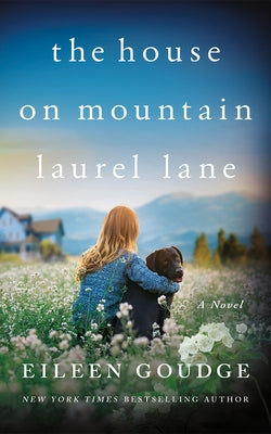Paperback of "The House on Mountain Laurel Lane" by Lake Union Publishing featuring a cover with a scenic house and mountain landscape.