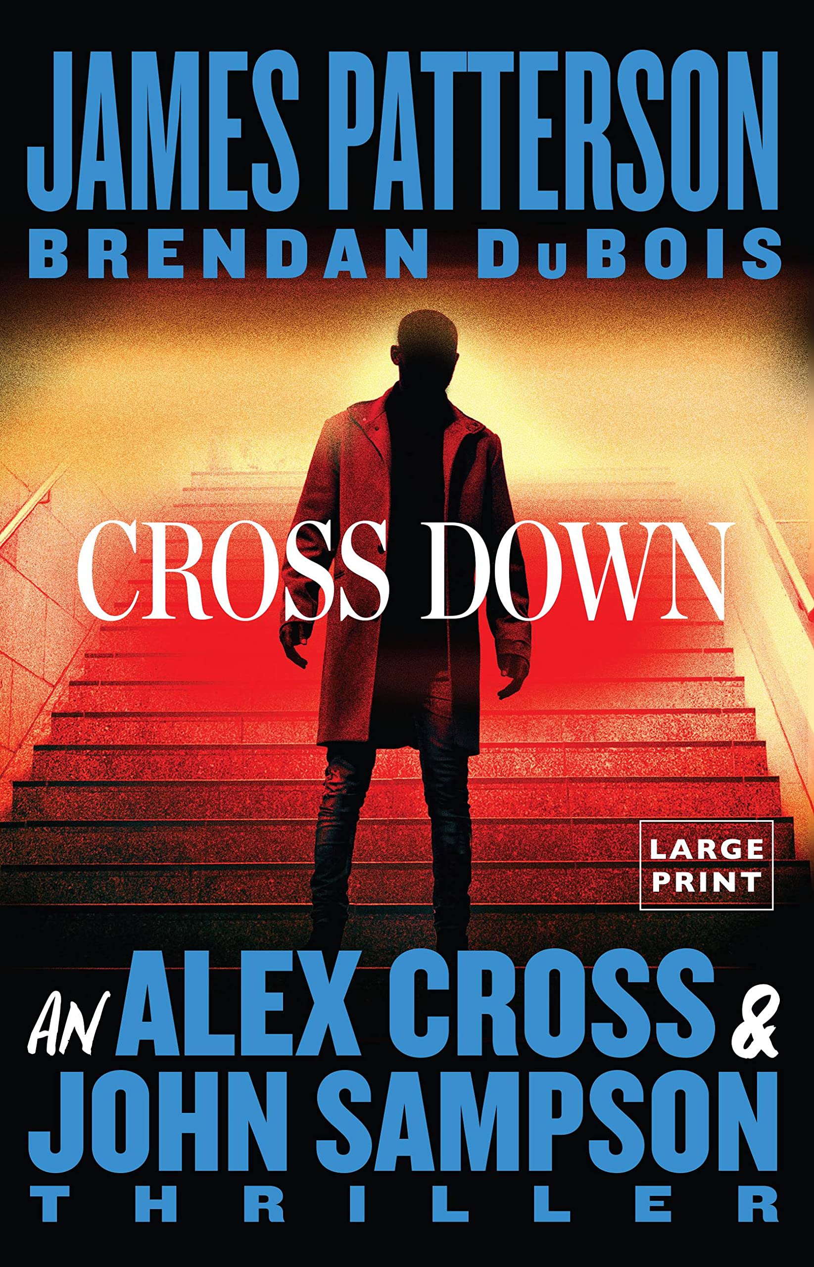 Paperback of "Cross Down" thriller by Little, Brown and Company featuring cover art with dark and intense imagery of Alex Cross and John Sampson.