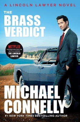 Paperback copy of "The Brass Verdict" by Little Brown and Company, showing the book's cover with title and author text.