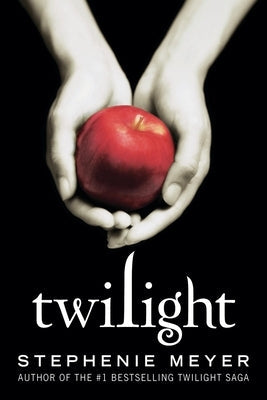 Paperback copy of Twilight by Little, Brown Books for Young Readers featuring a dark, mysterious cover design.