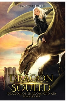 Paperback copy of Dragon Souled: Dragon of Shadow and Air Book 3 by Lmbpn Publishing, featuring dark and airy dragon illustrations.