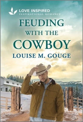 Mass market paperbound of "Feuding with the Cowboy" by Love Inspired, an uplifting romantic novel featuring cowboy characters.