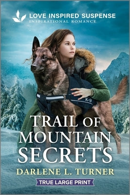 Paperback copy of "Trail of Mountain Secrets" from Love Inspired Suspense True Large Print series, featuring a mountain landscape on cover.