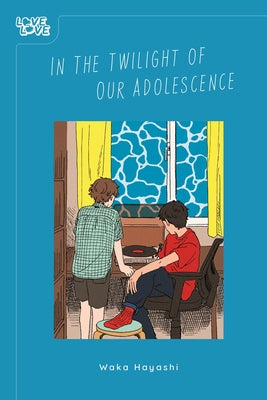Paperback copy of "In the Twilight of Our Adolescence" by Lovelove, with the book cover featuring the title and artistic design.