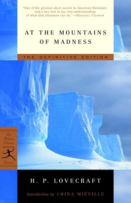 Paperback edition of "At the Mountains of Madness" by Modern Library, showing the book cover with dark, atmospheric artwork.