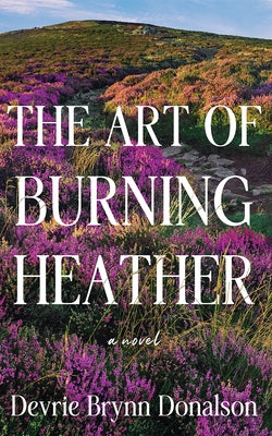 Paperback copy of "The Art of Burning Heather" by Montlake, showing the book cover with title and author details.