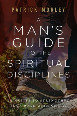 Paperback copy of "A Man's Guide to the Spiritual Disciplines" by Moody Publishers, featuring the book cover with title and subtitle.