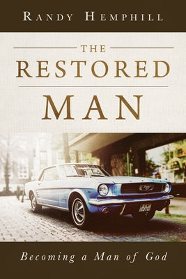 Paperback copy of "The Restored Man: Becoming a Man of God" by New Hope Publishers, featuring a cover with a serene design.