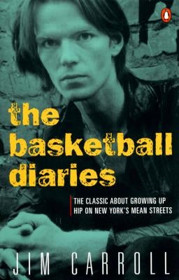 Paperback of The Basketball Diaries by Penguin Books, featuring a cover with urban street art reflecting New York City growing up.