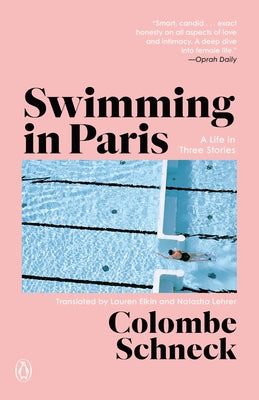 Paperback copy of "Swimming in Paris: A Life in Three Stories" by Penguin Publishing Group, featuring a book cover with a Parisian theme.
