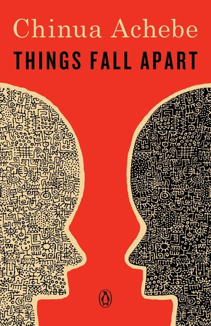 Paperback copy of "Things Fall Apart" by Penguin Publishing Group, featuring the book cover with title and author details.